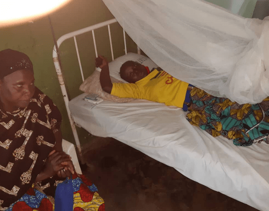 Photo: Hanatu Kefas, traumatised, in bed at a clinic at Zonkwa, Zangon Kataf LGA. [Credit: Taiwo Hassan Adebayo/Premium Times]