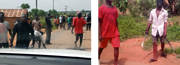 Weapon-wielding protesters after Yusuf Magaji’s body was recovered. [Source: Security.]